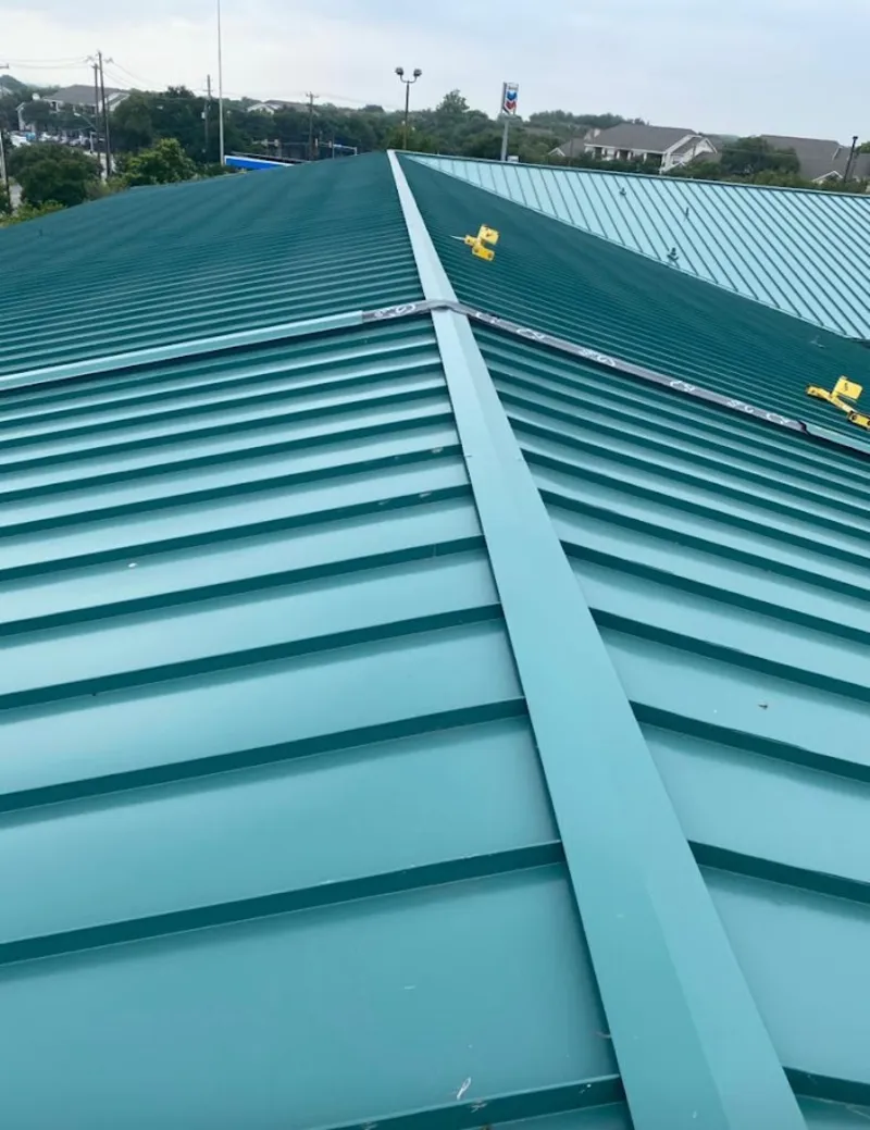 Green commercial metal roof ridge and valley for Metal Roof Repair in Diamond Springs